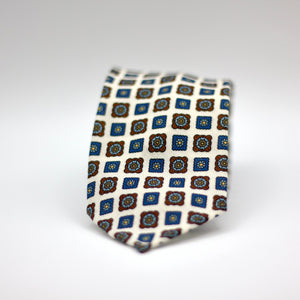 Cruciani & Bella 100%  Printed Wool  Unlined Hand rolled blades White, Brown, Blue and light blue Motif Tie Handmade in Italy 8 cm x 150 cm