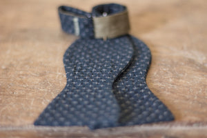 Noodles Bow Ties 100% Japanese Cotton  Blue navy, grey crosses Handcrafted in Italy Coated metal hardware  Olive green gabardine inside Hand-stitched labels Handmade boxes Self-tie bow ties