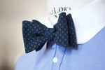 Noodles Bow Ties 100% Japanese Cotton  Blue navy, grey crosses Handcrafted in Italy Coated metal hardware  Olive green gabardine inside Hand-stitched labels Handmade boxes Self-tie bow ties